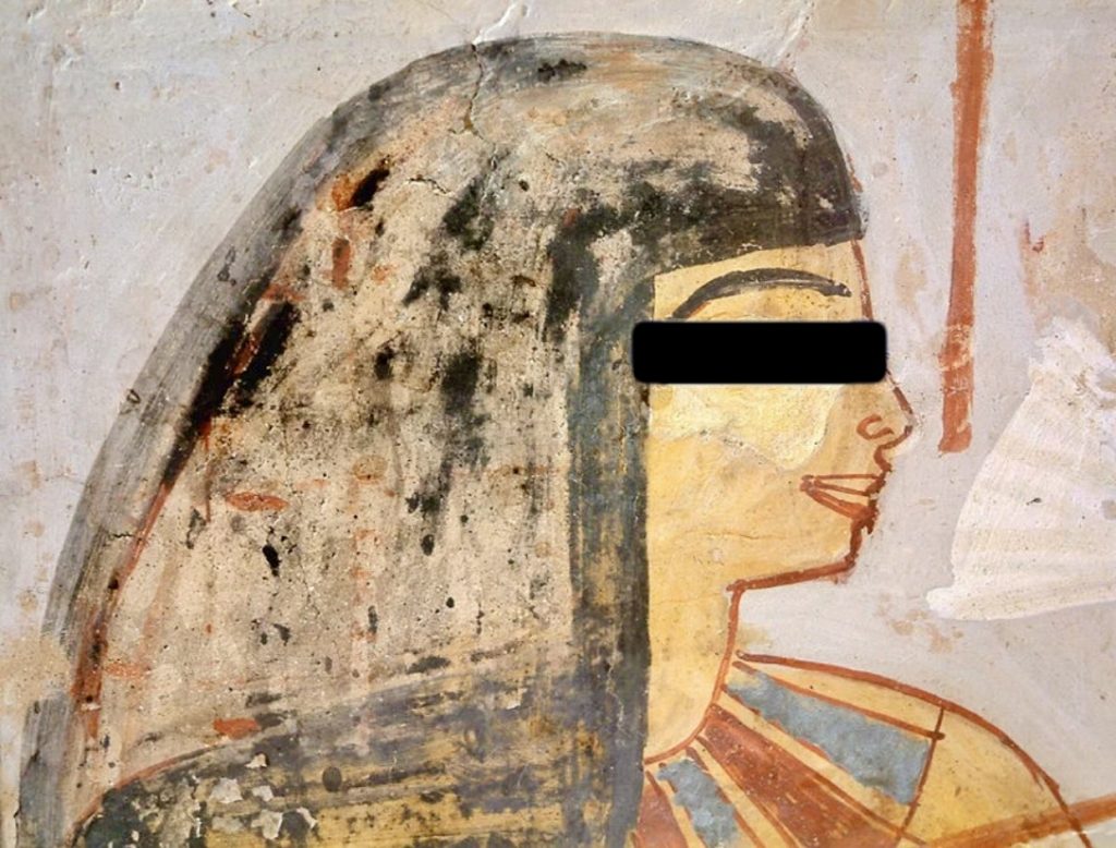 The same ancient Egyptian wall painting depicting a woman in profile, with a black rectangle covering her eye and part of her face.